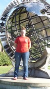 Nicole Beaupre standing in front of the KACC Globe